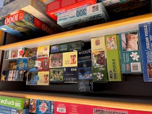 Photo of the puzzle exchange with many puzzles on the shelf