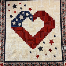 Quilts of Valor display at the library. This quilts have been made and given to military veterans for their service.